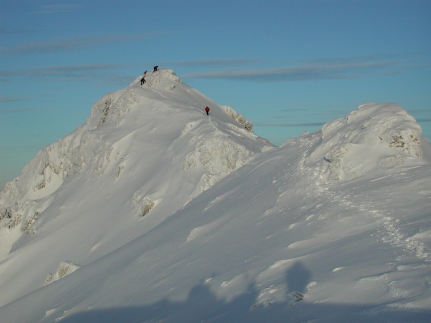 Summitting on the highest munro of Bein Eighe Torridon Spidean Coire nan Clach