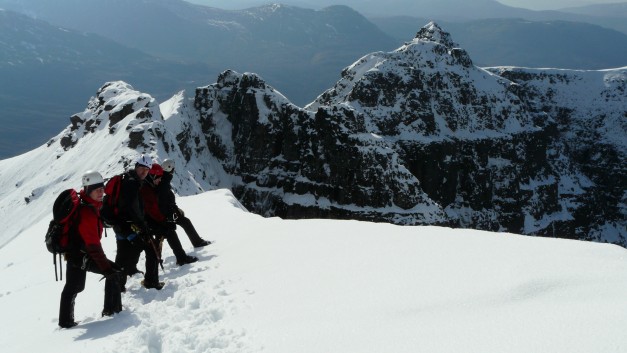 Mountaineering Approaching the Am Fasarinen traverse Liathach Ridge Feb 2010